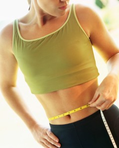 Woman Measuring Stomach